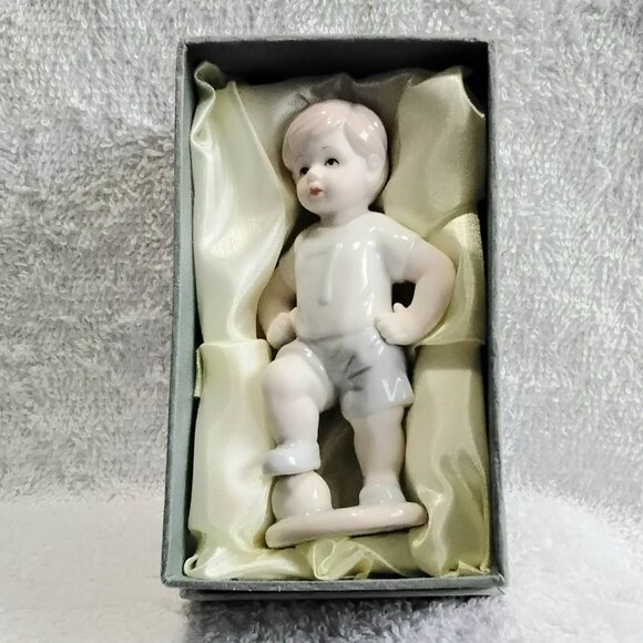 NFINITY Other - BNIB 3/$20 Boy Standing on Ball Porcelain Figurine Item # HP75 by Nfinity!!